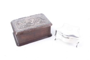 Two early 20th century silver mounted trinket boxes.