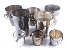 Eight silver plated and metal wine coolers or champagne buckets.