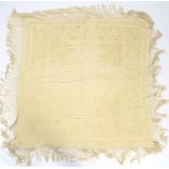 A 20th century cream silk shawl.