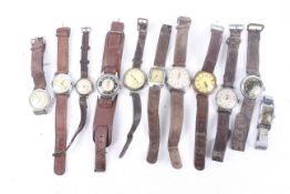 Eleven various gentleman's mid-size wrist watches, circa 1930s and 1950s.