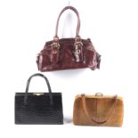 Three vintage ladies handbags.