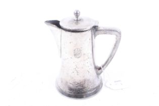 An Austrain plated and hammered hot water jug.
