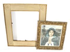 A 20th century framed print and an empty frame.
