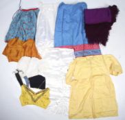 A selection of vintage clothing and textiles.