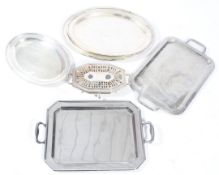 A selection of silver plated trays and a plate warmer. The trays of various sizes and designs, Max.