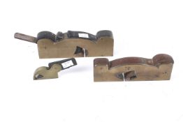 Three assorted antique solid brass wood working shoulder planes. Max.