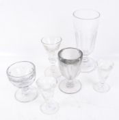 A collection of six 19th century glasses and later. Including a pair of penny licks, etc. Max. H17.