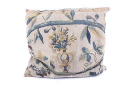 A fragment of a 17th or 18th century Flemish verdure tapestry converted into a cushion.