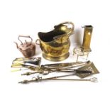 A collection of 20th century metalware items. Including a copper kettle and brass coal skuttle, etc.