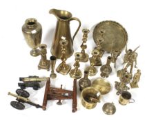 A collection of brassware ornaments.
