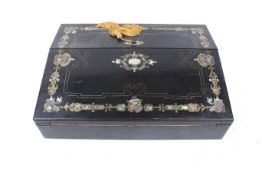 A 19th century ebonised and inlaid writing slope.