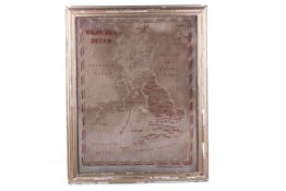 A Victorian needlepoint sampler, 'British Isles'. Worked in polychrome silks on linen, signed 'C.M.