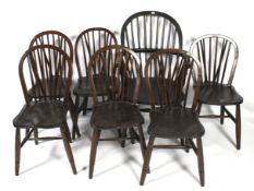 Six stained pine Windsor chairs.