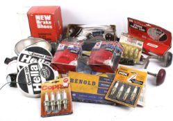 A box of assorted vintage car parts, accessories and tools.