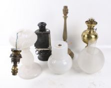 A group of four assorted table lamps.