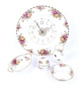 A group of five pieces of Royal Albert Old Country Roses china.
