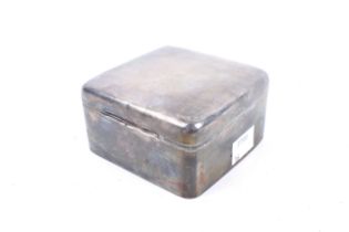 A silver square cigarette box with a hinged lid. Hallmarks for Birmingham 1921, 5cm high, approx.