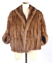 A 1950s brown mink jacket.