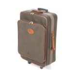 A Mulberry rolling suitcase.