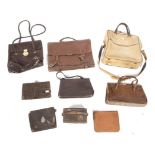 A collection of vintage handbags and clutch bags.