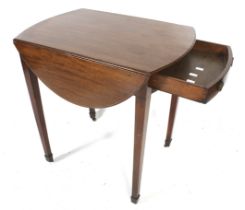 A mahogany pembroke table.