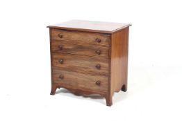 A 19th century mahogany commode, later adapted into a cupboard.