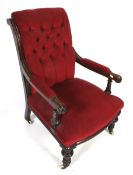 A Victorian mahogany button back chair.