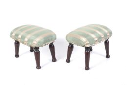 A pair of small Victorian mahogany footstools.