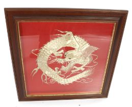 A Japanese gold-thread relief embroidery of a three-clawed dragon.