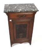 An Edwardian mahogany marble top cupboard.
