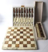 A 20th century Alabaster Stauton style chess & draughts set.
