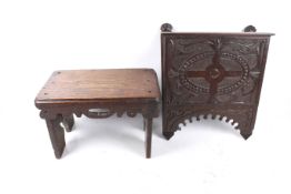 Carved oak foot stool and carved oak magazine wall rack.
