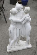 Three graces composite stone garden sculpture.