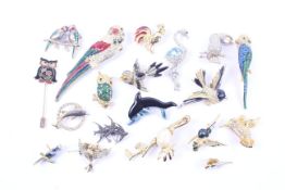 A collection of approximately 18 costume jewellery 'birds' brooches and jewellery.
