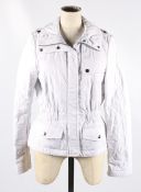 A 20th century ladies Burberry jacket. With a diamond quilt stitched polyester front.