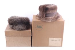 Two women's vintage winter fur hats. Jolly & Son, Bath, both in original boxes.