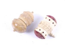 A Victorian thimble case and a sewing clamp.