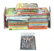 A collection of assorted vintage children's books.