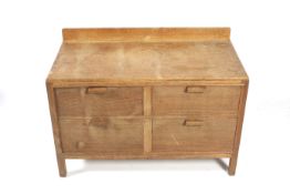 An early/mid-20th century oak low chest of drawers.
