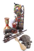 A collection of mostly African tribal artifacts.