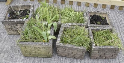Seven similar reconstituted stone square garden planters.