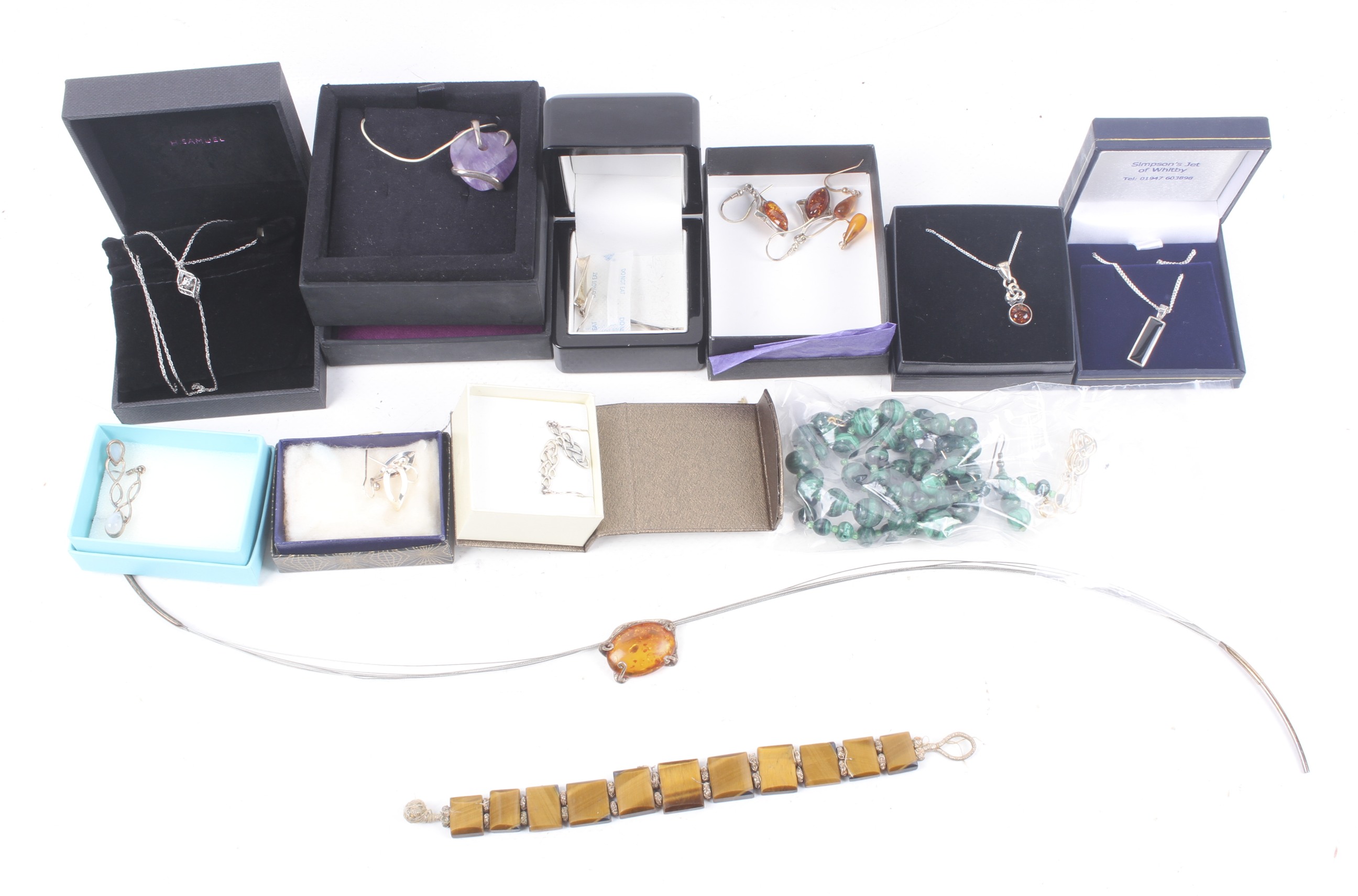 A collection of Baltic amber jewellery and various hard stone jewels.