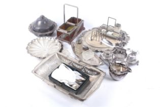 A collection of silver plate including an ink stand with a gun dog.