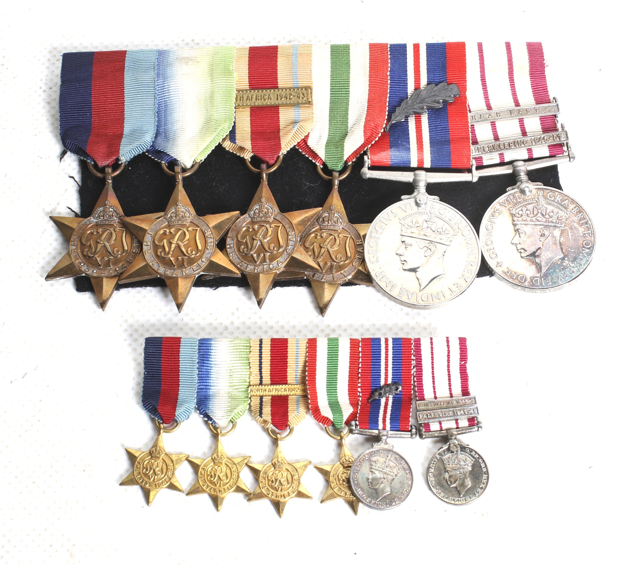 A WWII Royal Navy Officers Medal Group awarded to Lt. JRJ Cowlin, Royal Navy.
