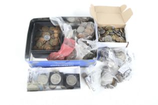A collection of assorted British and World coins. Including silver.