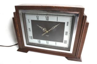 An Art Deco Smiths Sectric oak cased electric mantel clock.