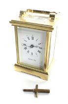 A 20th century English gilt brass carriage clock.