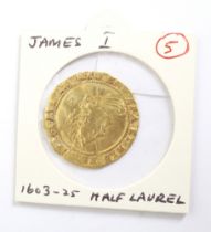 1603-1625 James I gold half laurel coin in VF condition. 27.5 mm diameter (mm.rose)
