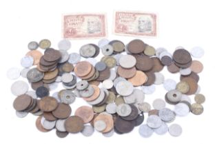 A collection of assorted world coins and bank notes.