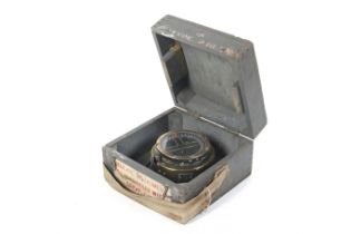 A type PII naval compass. In a brass fitting, plaque to the side marked AM 6A / 1672No.